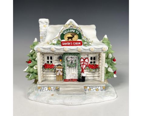Decorative ChristmasÂ&nbsp;piece made with hand painted resin, Welcome to Santa's Cabin, features chimney smoke, a shiny fini