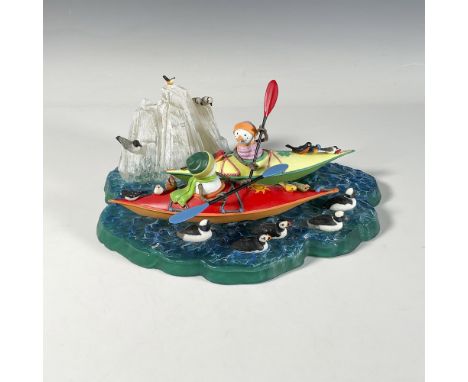 Crafted resin of two snowman kayaking with birds. Very colorful and festive Incorporated lighting that changes colors. Lenox 