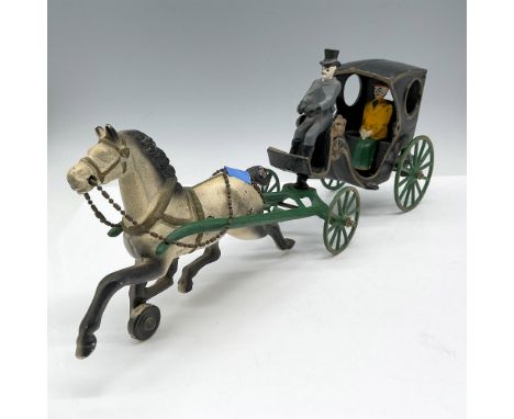 A step back in time reflecting horse drawn carriage with driver and passenger. Colored in black, green, gray and yellow. Issu