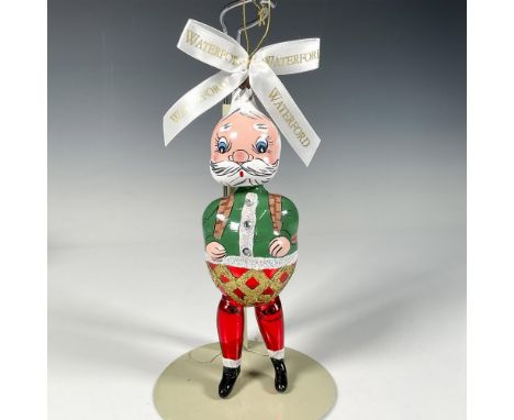 Handcrafted ornament, a limited edition (52/500) of In for the Night Santa, features Santa with a joyful expression, rosy che