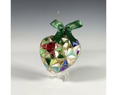 Handcrafted ornament with a stained glass design that forms a beautiful heart, featuring a geometric pattern with vibrant col
