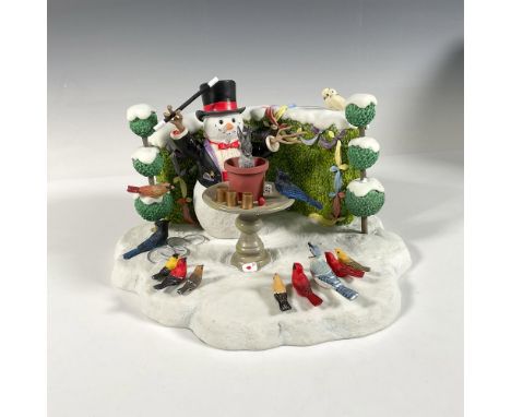 Hand painted resin of a Snowman Magician, with birds and a bunny. Certificate of Authenticity included. Incorporated lighting
