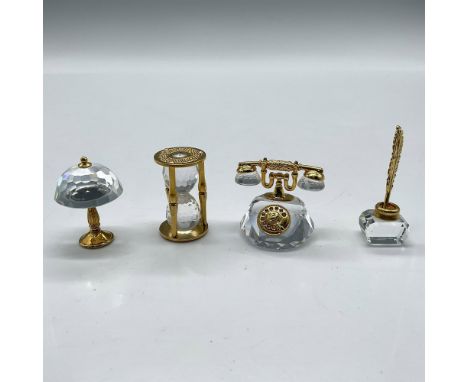 Crystal miniatures with gilded accents. Lot includes Table Lamp 180187, Hourglass 9460000012, Inkwell with Quill 189195 and T