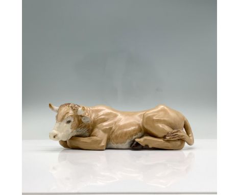 Features a brown gres ox laying down. This item has its original box measuring 13"L x 7.75"W x 6"H. Dimensions: 9"L x 4.5"W x