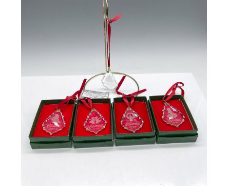Swarovski cut crystal pendants with etched year (1996, 1997, 1998, 1999 and 2000) and design adorned with gold filled loop. J
