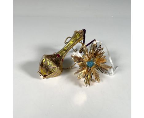 Handcrafted pair of ornaments featuring the Imperial Kildare Drop, adorned with shining ruby gems that complement an intricat