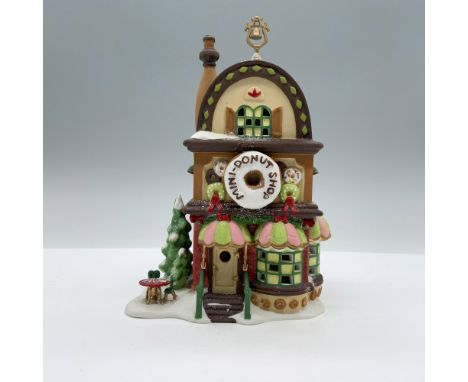 This porcelain figurine is hand painted. Department 56 backstamp. It comes with its original box, which measures 7.75"L x 6"W
