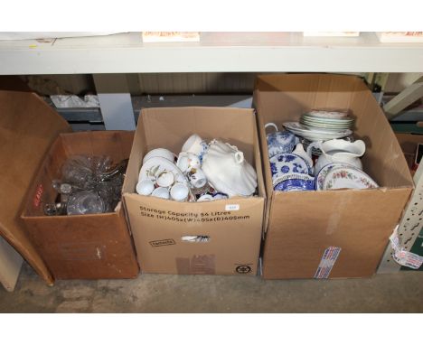 Three boxes containing various glass and china to include Royal Worcester 'Evesham', blue and white patterned plates etc.