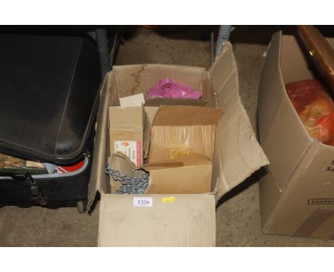 A box containing a length of chain, opaque glass lampshade etc. 