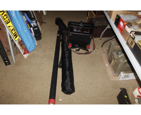 A fishing tool box / seat, a beach rod in hard carry case and a fishing shelter in carry bag