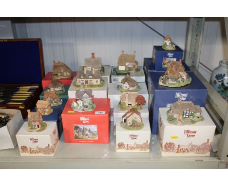 A collection of Lilliput Lane model cottages