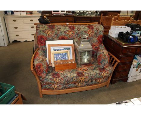 A light Ercol two seater sofa AF