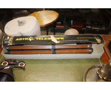 A Prinz Optics Astral telescope and stand 