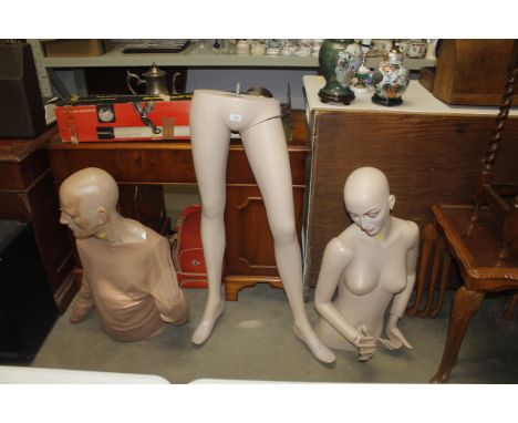 A female shop mannequin and a male torso mannequin