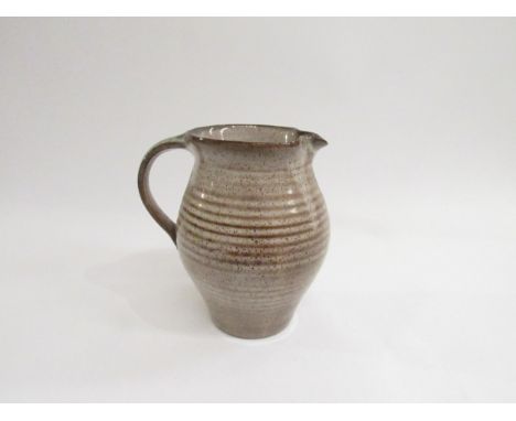 DAVID LEACH (1911-2005): A Studio Pottery jug in speckled brown glazes. Impressed seal, 17cm high 