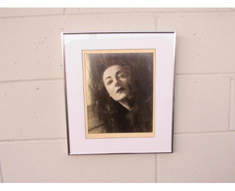 ANGUS McBEAN (1904-1990) A framed and glazed photograph, portrait in black and white, possibly Quentin Crisp. Signed bottom l