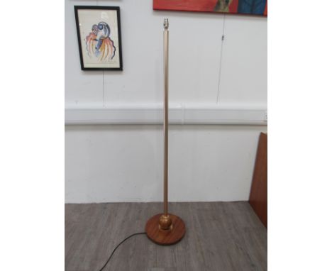 An Anodised metal standard lamp on a turned wooden base with ball feature to column. Overall height 155cm (Collectors Electri