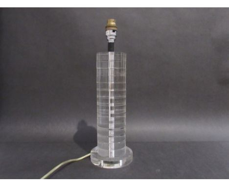 A cylindrical clear lucite lamp base,  38.5cm high overall (Collectors Electrical Item, See Information Pages) 