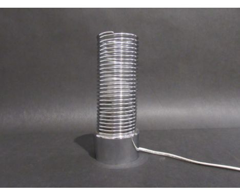 A Guzzini Jo Jo chromed metal Spring Lamp, designed by Heinz Brenker.  22.5cm high (Collectors Electrical Item, See Informati