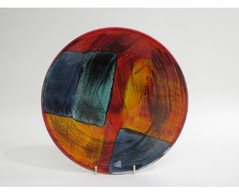 A Poole Pottery 'Gemstones' design shallow dish, Living Glaze range. Marks to base. 26.5cm diameter 