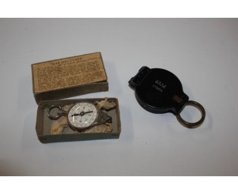 A German NEAG Berlin infantry compass together with a map measurer