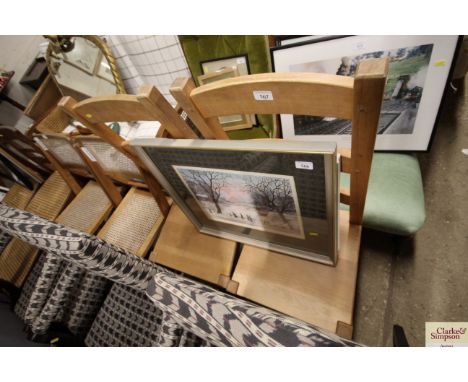 A pair of modern ladder back kitchen chairs