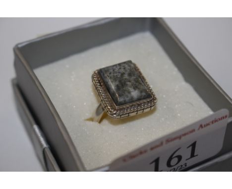 A vintage sterling silver and moss agate dress ring, size R/S, approximately 9g