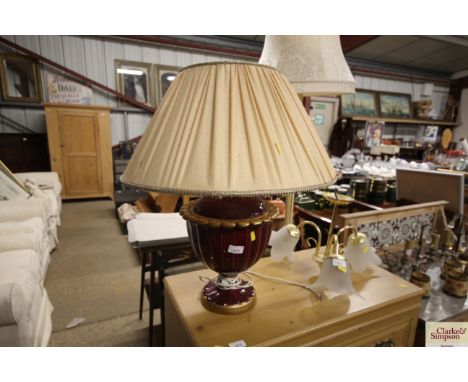 A pottery table lamp and shade