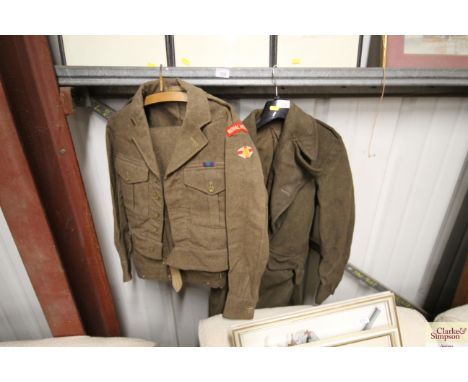 A Royal West Kent Regiment battle dress blouse and trousers and a great coat