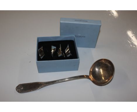 A white metal ladle, stamp numbered 12, approximately 8oz, and a boxed set of four Wedgwood napkin rings