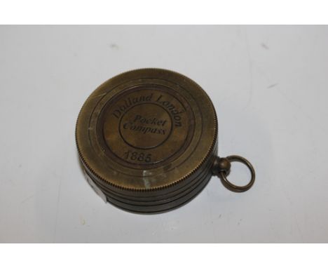 A brass sundial and compass (bears Dolland name and date)