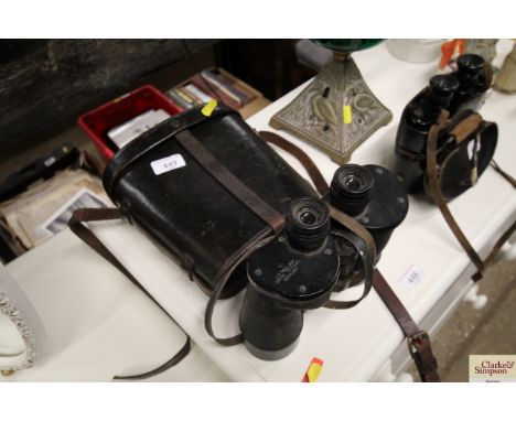 A pair of World War II British Army binoculars in leather case