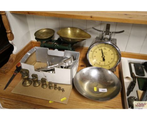 A set of Salter balance scales; cast iron and brass kitchen scales and weights and a mincer