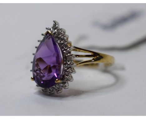 A 9ct gold, pear shape amethyst and diamond ring