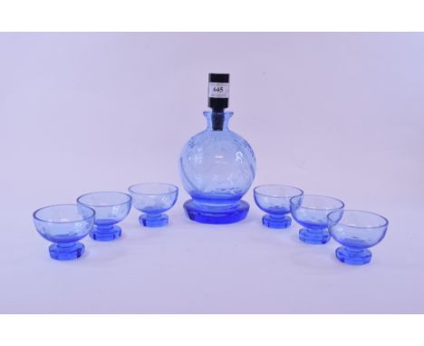 An etched blue glass liqueur decanter, and six matching glasses, a Wedgwood pottery bowl, with plated mounts, a canteen plate