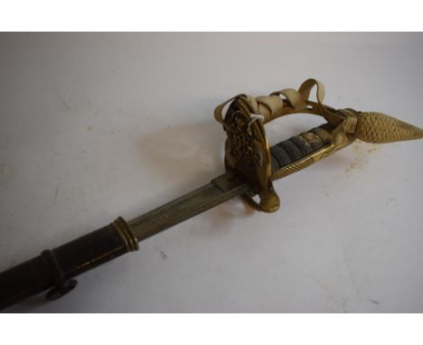A Victorian sword, the brass guard with VR cypher, with a scabbard   Condition report  ReportThe blade, scabbard and guard ha
