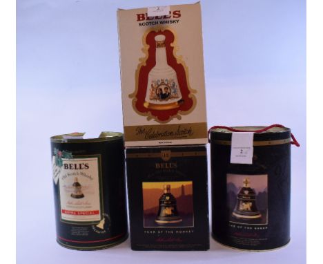A Bell's whisky decanter, Year of the Monkey, 1992, another, Year of the Sheep, 1991, another, Christmas, 1989, and a Prince 