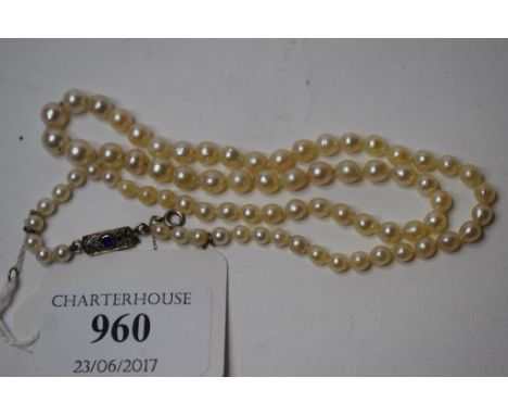 A single strand graduated pearl necklace, with a 9ct gold sapphire and diamond set clasp   Condition report  Condition report