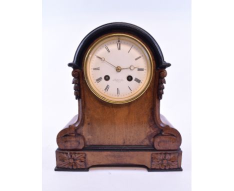 A mantel clock, the 10 cm white dial with Roman numerals, signed Aubert & Co, fitted an eight day movement, in a walnut case,