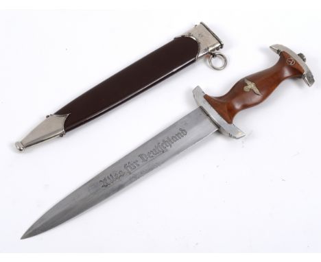 A German SA dagger, the blade marked RZM M7/37, with a scabbard  See illustration   Condition report  Report by GHSome wear t