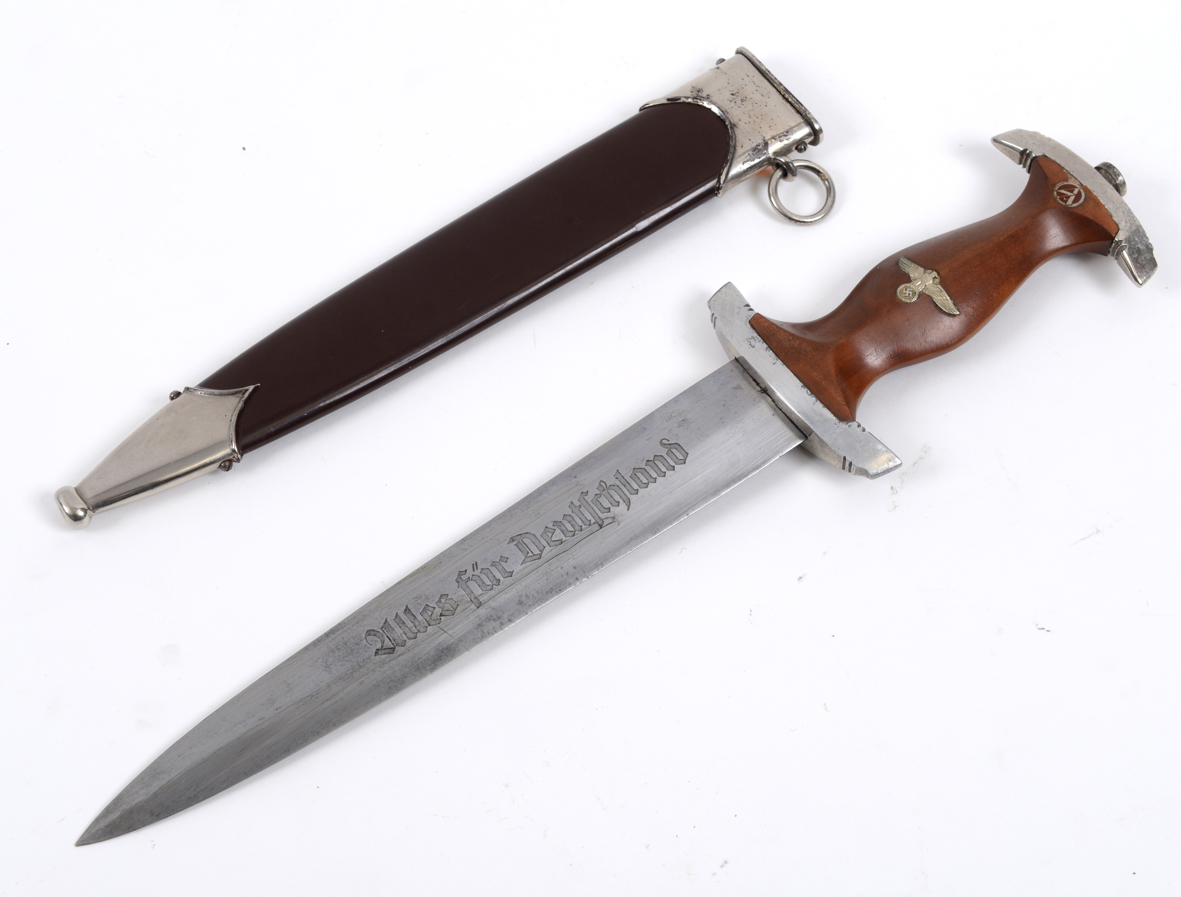 A German SA dagger, the blade marked RZM M7/37, with a scabbard See ...