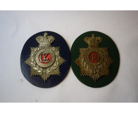 A Royal Berkshire Volunteers Ordinary ranks helmet badge 1885-1902, and a Princess Charlotte of Wales Ordinary ranks helmet p