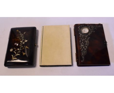 A tortoiseshell and ivory notebook, set a fob watch with silver coloured metal decoration and another similar with mother of 