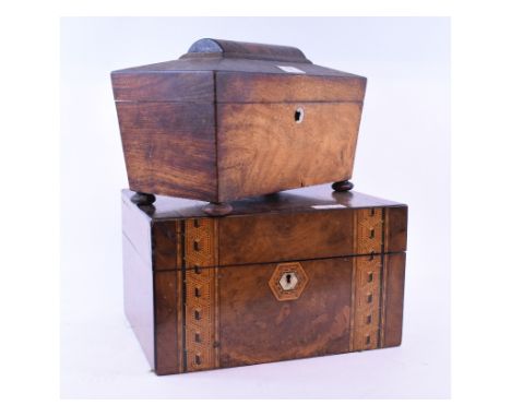 An inlaid walnut travelling dressing case, with fitted interior, 30 cm wide, and a rosewood tea caddy, of sarcophagus form, 3