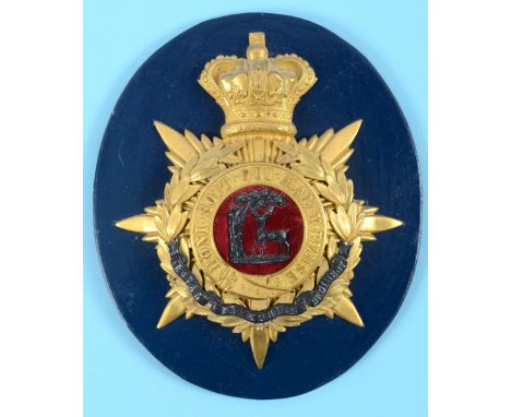 A Royal Berkshire Regiment (49th & 66th) Officers helmet plate 1886-1901, mounted on a plaque  See illustration