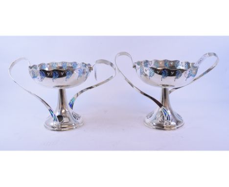 A pair of WMF electroplated two handled tazzas, with pierced and enamel decoration, 35 cm wide (2)   Condition report  Modern