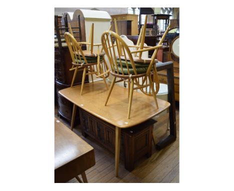 An Ercol elm dining table, 150 cm wide, and four matching chairs (5)