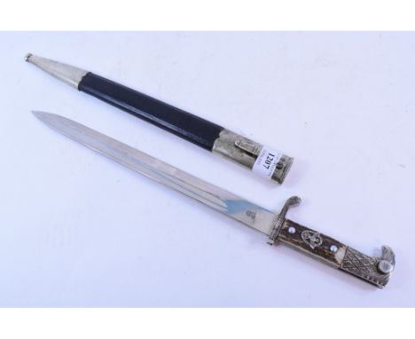 A German police bayonet, with an antler mounted handle, the blade stamped WEYERSBERG KIRSCHBAUM & CIE, Solingen, with a scabb