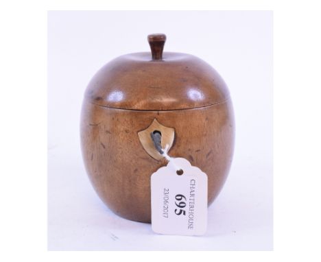 A turned wood tea caddy, in the form of an apple, 12 cm high   Condition report  Modern