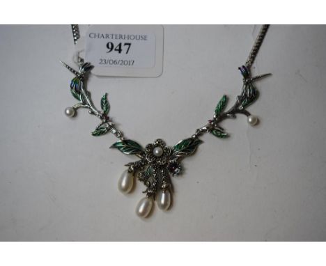 A silver, enamel, marcasite and pearl dragonfly necklace